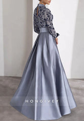 Pleated Long Sleeve Satin Waistband Flower Illusion Neck Beading Evening Gown